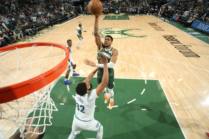 MILWAUKEE, WI - FEBRUARY 8: Giannis Antetokounmpo #34 of the Milwaukee Bucks shoots the ball during the game against the Minnesota Timberwolves on February 8, 2024 at the Fiserv Forum Center in Milwaukee, Wisconsin. NOTE TO USER: User expressly acknowledges and agrees that, by downloading and or using this Photograph, user is consenting to the terms and conditions of the Getty Images License Agreement. Mandatory Copyright Notice: Copyright 2024 NBAE (Photo by Gary Dineen/NBAE via Getty Images).