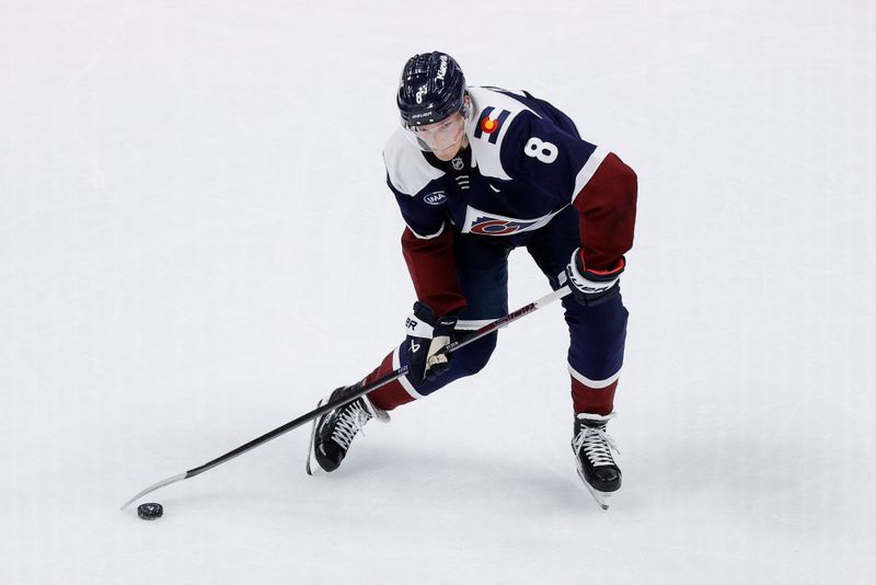 Oct 28, 2024; Denver, Colorado, USA; Colorado Avalanche defenseman Cale Makar (8) shoots the puck in the second period against the Chicago Blackhawks at Ball Arena. Mandatory Credit: Isaiah J. Downing-Imagn Images