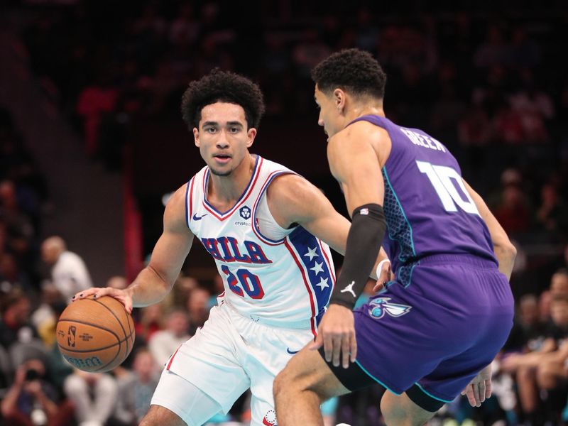 CHARLOTTE, NC - DECEMBER 3: Jared McCain #20 of the Philadelphia 76ers dribbles the ball during the game against the Charlotte Hornets during an NBA Emirates Cup game on December 3, 2024 at Spectrum Center in Charlotte, North Carolina. NOTE TO USER: User expressly acknowledges and agrees that, by downloading and or using this photograph, User is consenting to the terms and conditions of the Getty Images License Agreement. Mandatory Copyright Notice: Copyright 2024 NBAE (Photo by Brock Williams-Smith/NBAE via Getty Images)