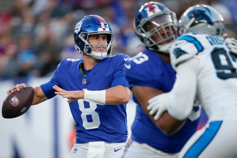 New York Giants quarterback Daniel Jones throws the ball during the first half of an NFL preseason football game against the Carolina Panthers, Friday, Aug. 18, 2023, in East Rutherford, N.J. (AP Photo/Bryan Woolston)