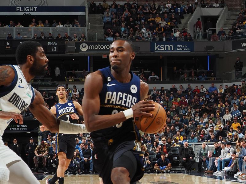 INDIANAPOLIS, IN - MARCH 27: Aaron Nesmith #23 of the Indiana Pacers drives to the basket during the game against the Dallas Mavericks on March 27, 2023 at Gainbridge Fieldhouse in Indianapolis, Indiana. NOTE TO USER: User expressly acknowledges and agrees that, by downloading and or using this Photograph, user is consenting to the terms and conditions of the Getty Images License Agreement. Mandatory Copyright Notice: Copyright 2023 NBAE (Photo by Ron Hoskins/NBAE via Getty Images)