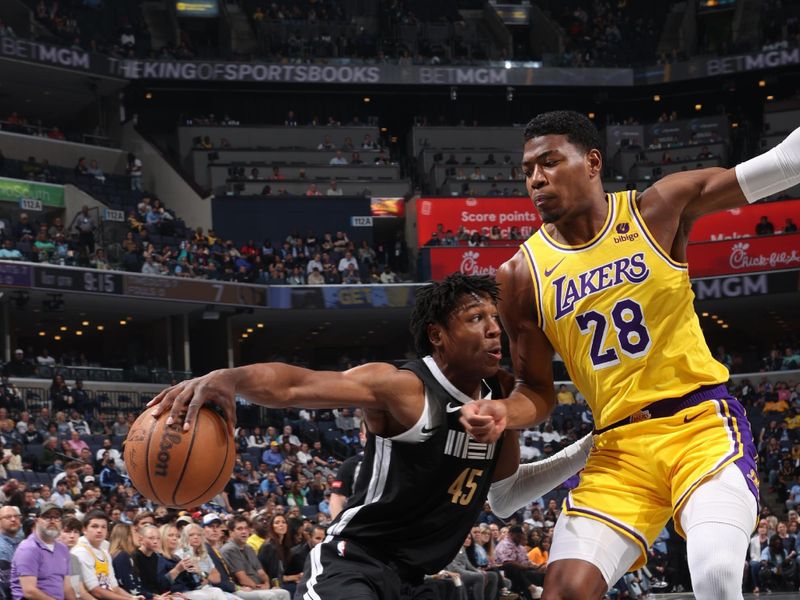 MEMPHIS, TN - APRIL 12: Rui Hachimura #28 of the Los Angeles Lakers plays defense against GG Jackson #45 of the Memphis Grizzlies on April 12, 2024 at FedExForum in Memphis, Tennessee. NOTE TO USER: User expressly acknowledges and agrees that, by downloading and or using this photograph, User is consenting to the terms and conditions of the Getty Images License Agreement. Mandatory Copyright Notice: Copyright 2024 NBAE (Photo by Joe Murphy/NBAE via Getty Images)