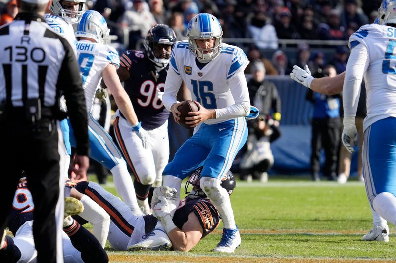 Chicago Bears linebacker Jack Sanborn (57) sacks Detroit Lions quarterback Jared Goff (16) during the second half of an NFL football game, Sunday, Nov. 13, 2022 in Chicago. The Lions won 31-30. (AP Photo/Nam Y. Huh)