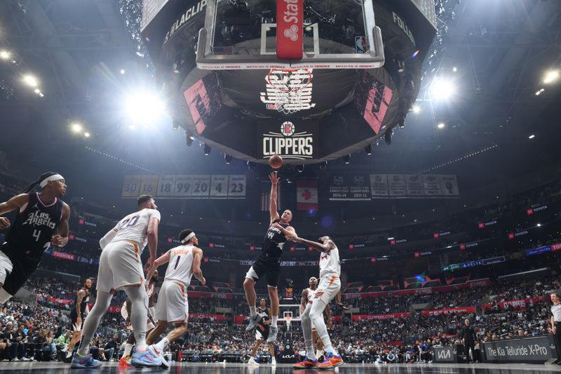 LOS ANGELES, CA - APRIL 10: Mason Plumlee #44 of the LA Clippers shoots the ball during the game against the Phoenix Suns on April 10, 2024 at Crypto.Com Arena in Los Angeles, California. NOTE TO USER: User expressly acknowledges and agrees that, by downloading and/or using this Photograph, user is consenting to the terms and conditions of the Getty Images License Agreement. Mandatory Copyright Notice: Copyright 2024 NBAE (Photo by Adam Pantozzi/NBAE via Getty Images)