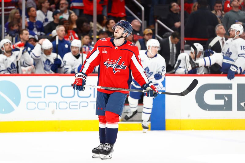 Mar 20, 2024; Washington, District of Columbia, USA; Washington Capitals center Connor McMichael (24) looks on after scoring a goal against the Toronto Maple Leafs during the second period at Capital One Arena. Mandatory Credit: Amber Searls-USA TODAY Sports