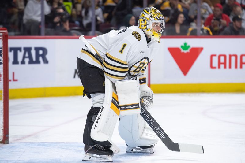 Jan 25, 2024; Ottawa, Ontario, CAN; Boston Bruins goalie Jeremy Swayman (1) warms up prior to the start of the first period against the Ottawa Senators at the Canadian Tire Centre. Mandatory Credit: Marc DesRosiers-USA TODAY Sports