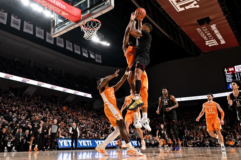 Feb 21, 2023; College Station, Texas, USA;  Texas A&M Aggies guard Dexter Dennis (0) shoots against the Tennessee Volunteers during the second half at Reed Arena. Mandatory Credit: Maria Lysaker-USA TODAY Sports