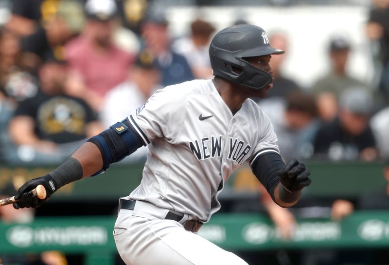 Sep 17, 2023; Pittsburgh, Pennsylvania, USA;  New York Yankees center fielder Estevan Florial (90) hits a single against the Pittsburgh Pirates during the sixth inning at PNC Park. Pittsburgh won 3-2. Mandatory Credit: Charles LeClaire-USA TODAY Sports