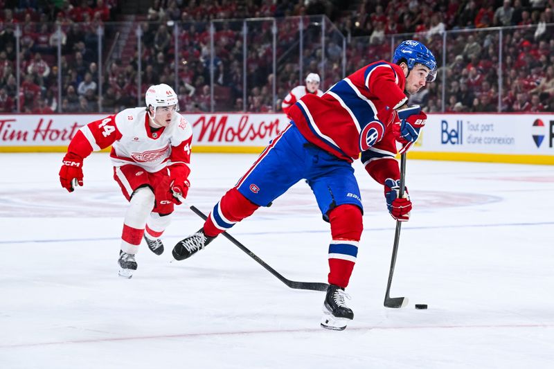 Jan 10, 2026; Montreal, Quebec, CAN; Montreal Canadiens left wing Alexandre Texier (85) shoots the puck against the Detroit Red Wings during the third period at Bell Centre. Mandatory Credit: David Kirouac-Imagn Images