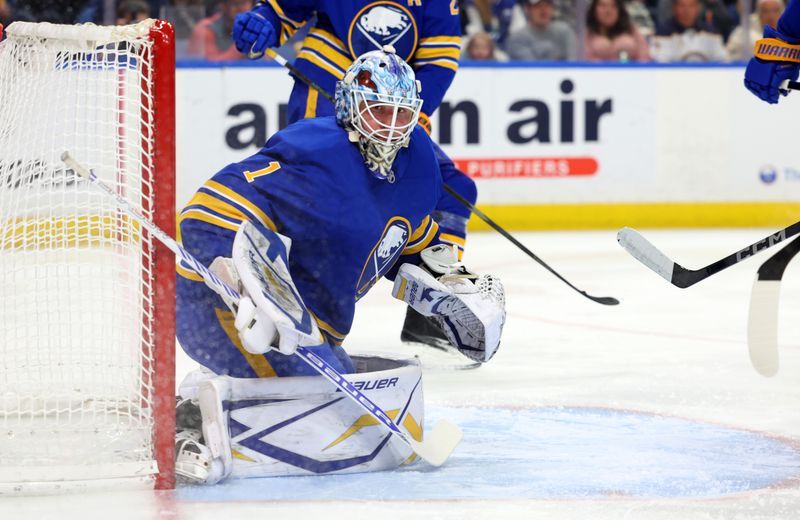 Mar 15, 2025; Buffalo, New York, USA;  Buffalo Sabres goaltender Ukko-Pekka Luukkonen (1) looks for the puck during the first period against the Vegas Golden Knights at KeyBank Center. Mandatory Credit: Timothy T. Ludwig-Imagn Images