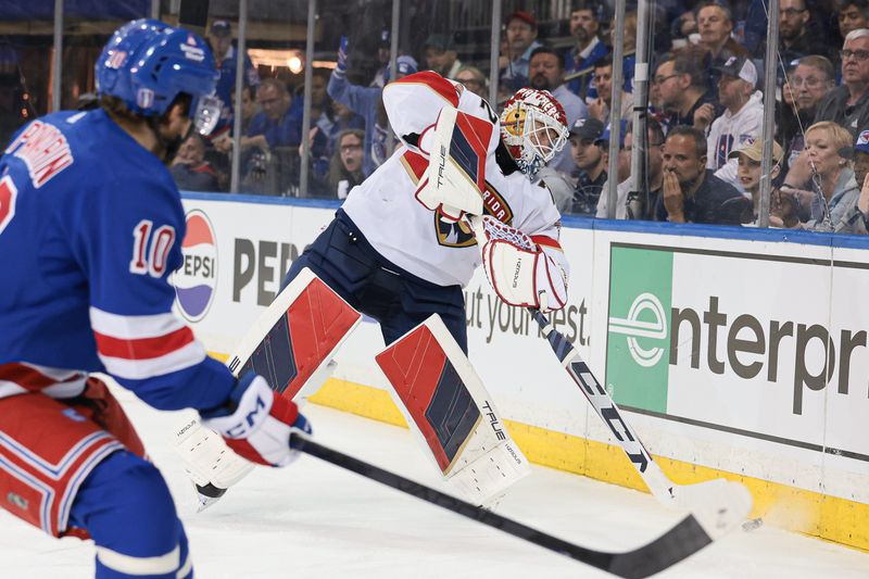 May 24, 2024; New York, New York, USA; Florida Panthers goaltender Sergei Bobrovsky (72) plays the puck in front of New York Rangers left wing Artemi Panarin (10) during the second period in game two of the Eastern Conference Final of the 2024 Stanley Cup Playoffs at Madison Square Garden. Mandatory Credit: Vincent Carchietta-USA TODAY Sports