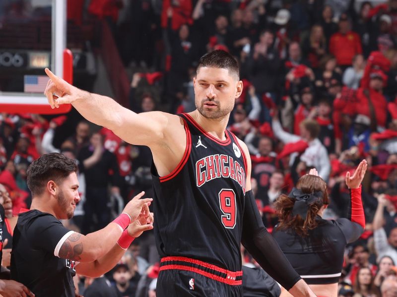 CHICAGO, IL - APRIL 17:  Nikola Vucevic #9 of the Chicago Bulls looks on during the game against the Atlanta Hawks during the 2024 Play-In Tournament  on April 17, 2024 at United Center in Chicago, Illinois. NOTE TO USER: User expressly acknowledges and agrees that, by downloading and or using this photograph, User is consenting to the terms and conditions of the Getty Images License Agreement. Mandatory Copyright Notice: Copyright 2024 NBAE (Photo by Jeff Haynes/NBAE via Getty Images)