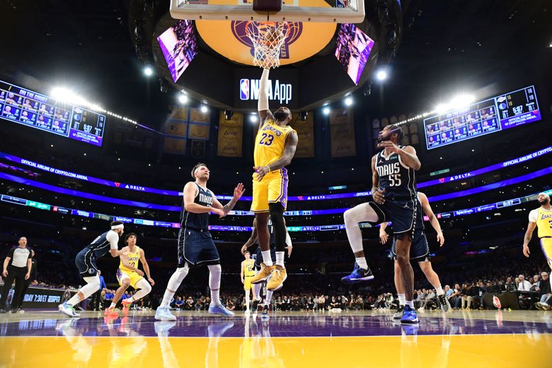 LOS ANGELES, CA - JANUARY 17: LeBron James #23 of the Los Angeles Lakers shoots the ball during the game against the Dallas Mavericks on January 17, 2024 at Crypto.Com Arena in Los Angeles, California. NOTE TO USER: User expressly acknowledges and agrees that, by downloading and/or using this Photograph, user is consenting to the terms and conditions of the Getty Images License Agreement. Mandatory Copyright Notice: Copyright 2024 NBAE (Photo by Adam Pantozzi/NBAE via Getty Images)