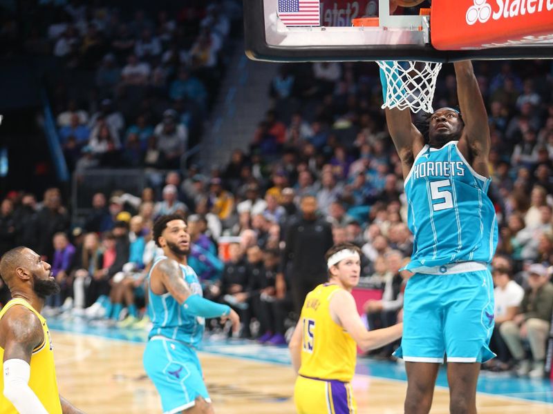 CHARLOTTE, NC - JANUARY 27:  Mark Williams #5 of the Charlotte Hornets dunks the ball during the game against the Los Angeles Lakers on January 27, 2025 at Spectrum Center in Charlotte, North Carolina. NOTE TO USER: User expressly acknowledges and agrees that, by downloading and or using this photograph, User is consenting to the terms and conditions of the Getty Images License Agreement. Mandatory Copyright Notice: Copyright 2025 NBAE (Photo by Kent Smith/NBAE via Getty Images)