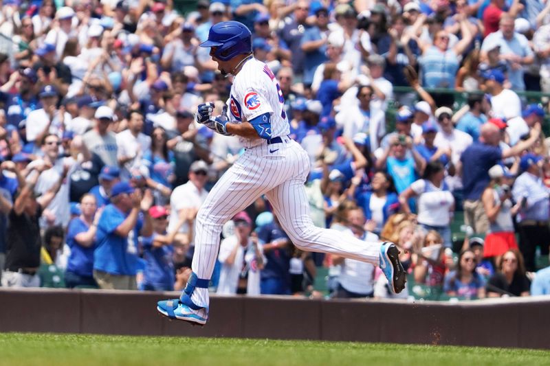 Jun 18, 2023; Chicago, Illinois, USA; Chicago Cubs designated hitter Christopher Morel (5) runs the bases after hitting a two-run homer against the Baltimore Orioles during the fourth inning at Wrigley Field. Mandatory Credit: David Banks-USA TODAY Sports