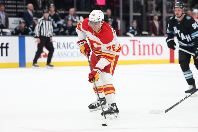 Oct 30, 2024; Salt Lake City, Utah, USA; Calgary Flames center Martin Pospisil (76) prepares to shoot against the Utah Hockey Club during the first period at Delta Center. Mandatory Credit: Rob Gray-Imagn Images