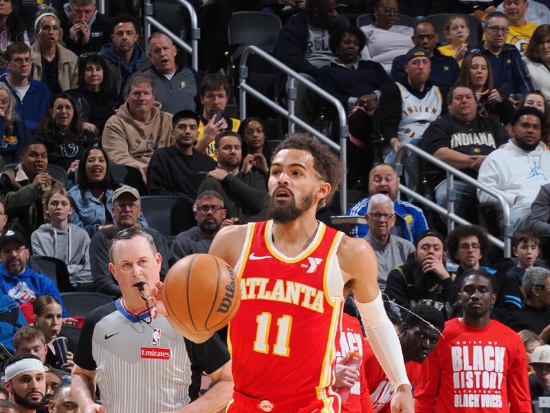 INDIANAPOLIS, IN - FEBRUARY 1: Trae Young #11 of the Atlanta Hawks dribbles the ball during the game against the Indiana Pacers on February 1, 2025 at Gainbridge Fieldhouse in Indianapolis, Indiana. NOTE TO USER: User expressly acknowledges and agrees that, by downloading and or using this Photograph, user is consenting to the terms and conditions of the Getty Images License Agreement. Mandatory Copyright Notice: Copyright 2025 NBAE (Photo by Ron Hoskins/NBAE via Getty Images)