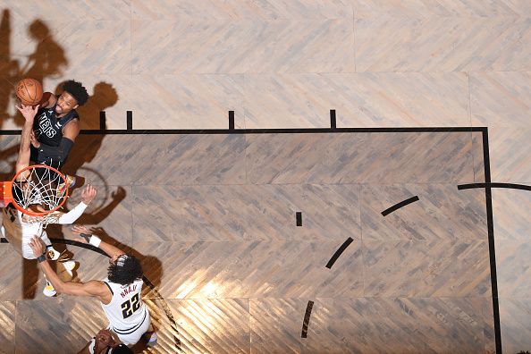 BROOKLYN, NY - DECEMBER 22: Dennis Smith Jr. #4 of the Brooklyn Nets goes to the basket during the game on December 22, 2023 at Barclays Center in Brooklyn, New York. NOTE TO USER: User expressly acknowledges and agrees that, by downloading and or using this Photograph, user is consenting to the terms and conditions of the Getty Images License Agreement. Mandatory Copyright Notice: Copyright 2023 NBAE (Photo by Nathaniel S. Butler/NBAE via Getty Images)