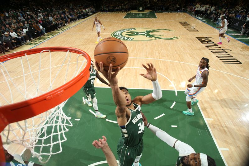 MILWAUKEE, WI - MARCH 24:  Giannis Antetokounmpo #34 of the Milwaukee Bucks drives to the basket during the game against the Oklahoma City Thunder on March 24, 2024 at the Fiserv Forum Center in Milwaukee, Wisconsin. NOTE TO USER: User expressly acknowledges and agrees that, by downloading and or using this Photograph, user is consenting to the terms and conditions of the Getty Images License Agreement. Mandatory Copyright Notice: Copyright 2024 NBAE (Photo by Gary Dineen/NBAE via Getty Images).