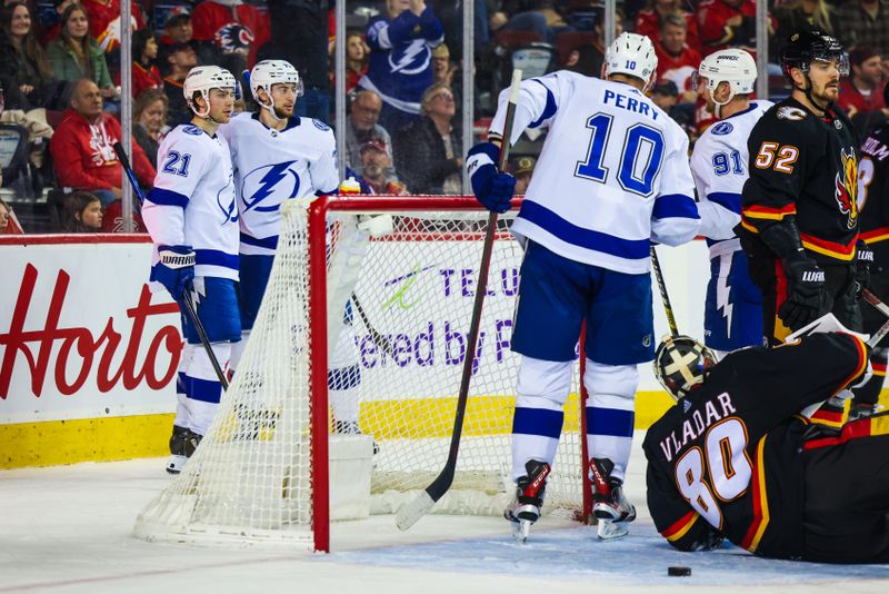 Jan 21, 2023; Calgary, Alberta, CAN; Tampa Bay Lightning center Anthony Cirelli (71) scores a goal against the Calgary Flames during the third period at Scotiabank Saddledome. Mandatory Credit: Sergei Belski-USA TODAY Sports