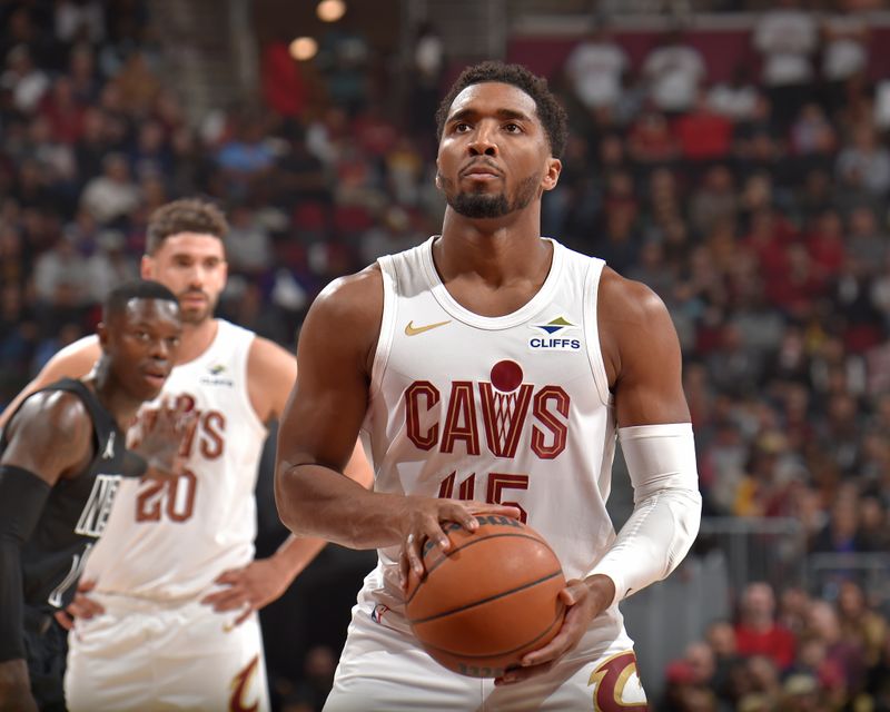 CLEVELAND, OH - NOVEMBER 9: Donovan Mitchell #45 of the Cleveland Cavaliers prepares to shoot a free throw during the game against the Brooklyn Nets on November 9, 2024 at Rocket Mortgage FieldHouse in Cleveland, Ohio. NOTE TO USER: User expressly acknowledges and agrees that, by downloading and/or using this Photograph, user is consenting to the terms and conditions of the Getty Images License Agreement. Mandatory Copyright Notice: Copyright 2024 NBAE (Photo by David Liam Kyle/NBAE via Getty Images)