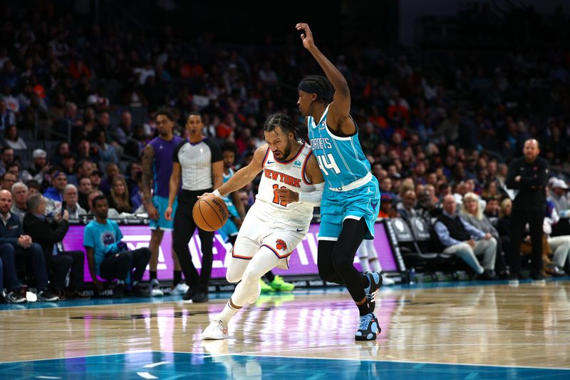 CHARLOTTE, NORTH CAROLINA - JANUARY 29: Jalen Brunson #11 of the New York Knicks drives to the basket against c44 during the second half of the game at Spectrum Center on January 29, 2024 in Charlotte, North Carolina. NOTE TO USER: User expressly acknowledges and agrees that, by downloading and or using this photograph, User is consenting to the terms and conditions of the Getty Images License Agreement. (Photo by Jared C. Tilton/Getty Images)