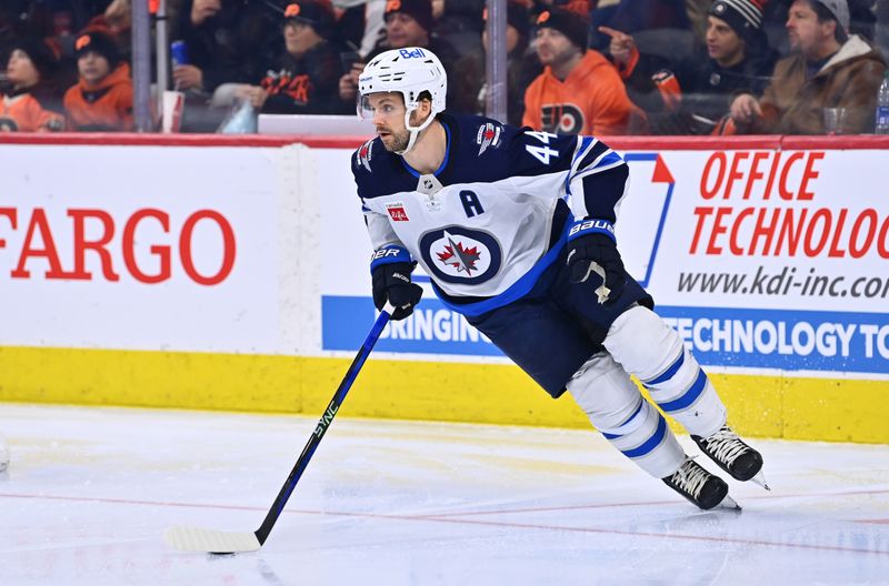 Jan 22, 2023; Philadelphia, Pennsylvania, USA; Winnipeg Jets defenseman Josh Morrissey (44) carries the puck against the Philadelphia Flyers in the second period at Wells Fargo Center. Mandatory Credit: Kyle Ross-USA TODAY Sports