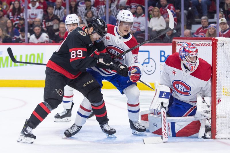Jan 17, 2026; Ottawa, Ontario, CAN; Ottawa Senators center Lars Eller (89) battles for position with Montreal Canadiens defenseman Kaiden Guhle (21) as they stand in front of goalie Samuel Montembeault (35) in the first period at the Canadian Tire Centre. Mandatory Credit: Marc DesRosiers-IMAGN Images