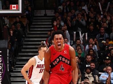 TORONTO, CANADA - DECEMBER 6: Scottie Barnes #4 of the Toronto Raptors celebrates during the game against the Miami Heat on December 6, 2023 at the Scotiabank Arena in Toronto, Ontario, Canada.  NOTE TO USER: User expressly acknowledges and agrees that, by downloading and or using this Photograph, user is consenting to the terms and conditions of the Getty Images License Agreement.  Mandatory Copyright Notice: Copyright 2023 NBAE (Photo by Vaughn Ridley/NBAE via Getty Images)