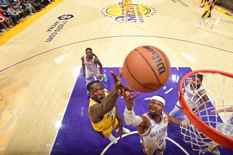 LOS ANGELES, CA - MARCH 4: Taurean Prince #12 of the Los Angeles Lakers drives to the basket during the game against the Oklahoma City Thunder on March 4, 2024 at Crypto.Com Arena in Los Angeles, California. NOTE TO USER: User expressly acknowledges and agrees that, by downloading and/or using this Photograph, user is consenting to the terms and conditions of the Getty Images License Agreement. Mandatory Copyright Notice: Copyright 2024 NBAE (Photo by Andrew D. Bernstein/NBAE via Getty Images)