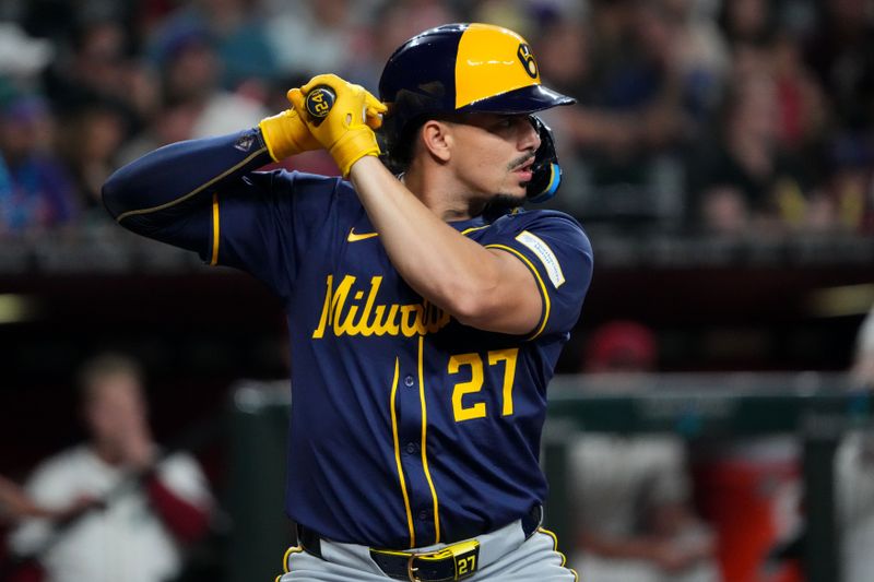 Sep 13, 2024; Phoenix, Arizona, USA; Milwaukee Brewers shortstop Willy Adames (27) bats against the Arizona Diamondbacks during the first inning at Chase Field. Mandatory Credit: Joe Camporeale-Imagn Images