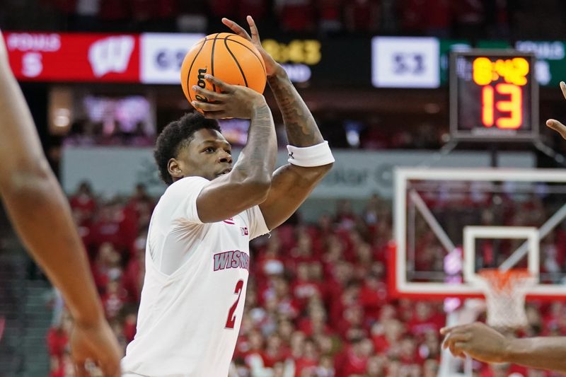 Jan 26, 2024; Madison, Wisconsin, USA; Wisconsin Badgers guard AJ Storr (2) shoots a three point basket during the second half against the Wisconsin Badgers at the Kohl Center. Mandatory Credit: Kayla Wolf-USA TODAY Sports