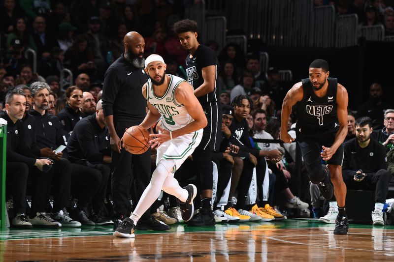 BOSTON, MA - FEBRUARY 14: Derrick White #9 of the Boston Celtics handles the ball during the game against the Brooklyn Nets on February 14, 2024 at the TD Garden in Boston, Massachusetts. NOTE TO USER: User expressly acknowledges and agrees that, by downloading and or using this photograph, User is consenting to the terms and conditions of the Getty Images License Agreement. Mandatory Copyright Notice: Copyright 2024 NBAE  (Photo by Brian Babineau/NBAE via Getty Images)