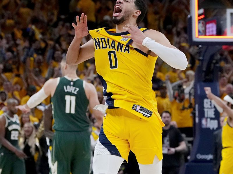 INDIANAPOLIS, INDIANA - APRIL 26: Tyrese Haliburton #0 of the Indiana Pacers celebrates after beating the Milwaukee Bucks 121-119 in overtime during game three of the Eastern Conference First Round Playoffs at Gainbridge Fieldhouse on April 26, 2024 in Indianapolis, Indiana. NOTE TO USER: User expressly acknowledges and agrees that, by downloading and or using this photograph, User is consenting to the terms and conditions of the Getty Images License Agreement. (Photo by Dylan Buell/Getty Images)