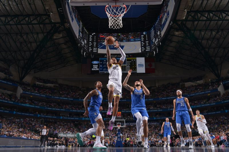 DALLAS, TX - OCTOBER 28: Keyonte George #3 of the Utah Jazz drives to the basket during the game against the Dallas Mavericks on October 28, 2024 at American Airlines Center in Dallas, Texas. NOTE TO USER: User expressly acknowledges and agrees that, by downloading and or using this photograph, User is consenting to the terms and conditions of the Getty Images License Agreement. Mandatory Copyright Notice: Copyright 2024 NBAE (Photo by Glenn James/NBAE via Getty Images)