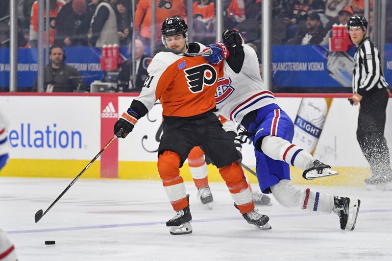 Jan 10, 2024; Philadelphia, Pennsylvania, USA; Philadelphia Flyers center Scott Laughton (21) avoids check by Montreal Canadiens defenseman Justin Barron (52) during third period at Wells Fargo Center. Mandatory Credit: Eric Hartline-USA TODAY Sports