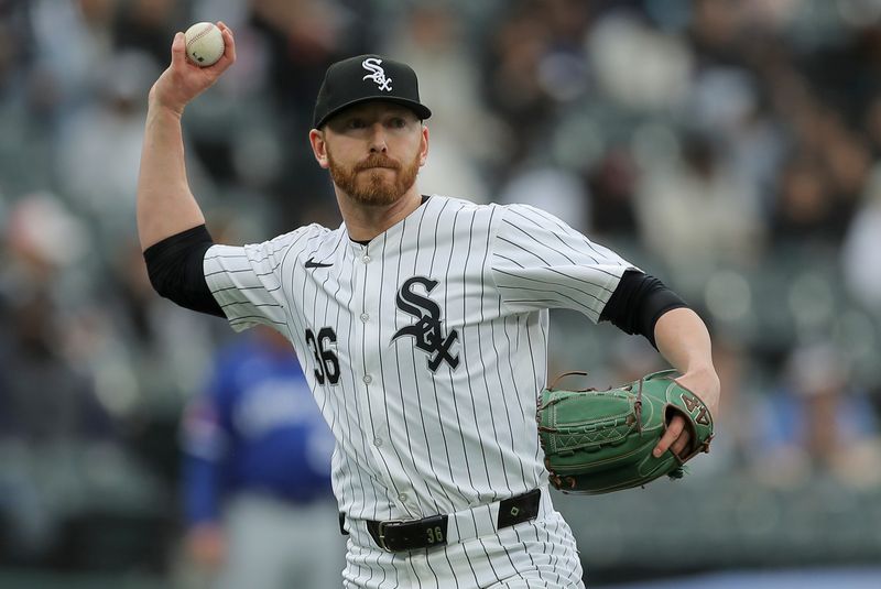 Apr 17, 2024; Chicago, Illinois, USA; Chicago, Illinois, USA; Chicago White Sox relief pitcher Steven Wilson (36) throws the the ball to first base in the seventh inning during game one of a double header against the Kansas City Royals at Guaranteed Rate Field. Mandatory Credit: Melissa Tamez-USA TODAY Sports
