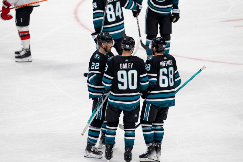 Feb 27, 2024; San Jose, California, USA;  San Jose Sharks center Ryan Carpenter (22) and San Jose Sharks right wing Justin Bailey (90) and center Mike Hoffman (68) celebrate after the goal against the New Jersey Devils during the third period at SAP Center at San Jose. Mandatory Credit: Neville E. Guard-USA TODAY Sports