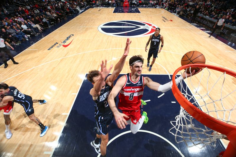 WASHINGTON, DC -? MARCH 6:  Deni Avdija #8 of the Washington Wizards goes to the basket during the game on March 6, 2024 at Capital One Arena in Washington, DC. NOTE TO USER: User expressly acknowledges and agrees that, by downloading and or using this Photograph, user is consenting to the terms and conditions of the Getty Images License Agreement. Mandatory Copyright Notice: Copyright 2024 NBAE (Photo by Stephen Gosling/NBAE via Getty Images)