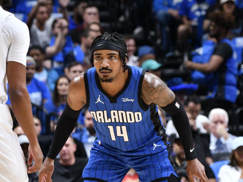 ORLANDO, FL - APRIL 27: Gary Harris #14 of the Orlando Magic plays defense during the game against the Cleveland Cavaliers during Round 1 Game 4 of the 2024 NBA Playoffs on April 27, 2024 at the Kia Center in Orlando, Florida. NOTE TO USER: User expressly acknowledges and agrees that, by downloading and or using this photograph, User is consenting to the terms and conditions of the Getty Images License Agreement. Mandatory Copyright Notice: Copyright 2024 NBAE (Photo by Fernando Medina/NBAE via Getty Images)