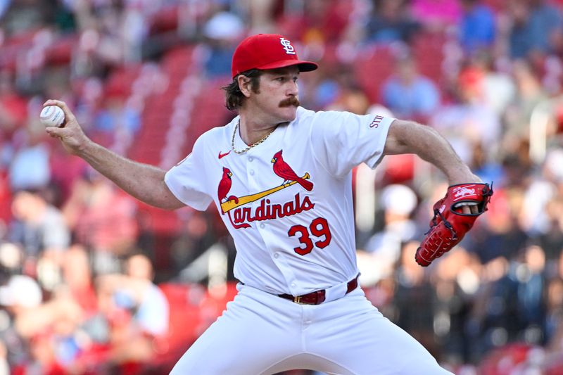 Jun 11, 2024; St. Louis, Missouri, USA;  St. Louis Cardinals starting pitcher Miles Mikolas (39) pitches against the Pittsburgh Pirates during the first inning at Busch Stadium. Mandatory Credit: Jeff Curry-USA TODAY Sports