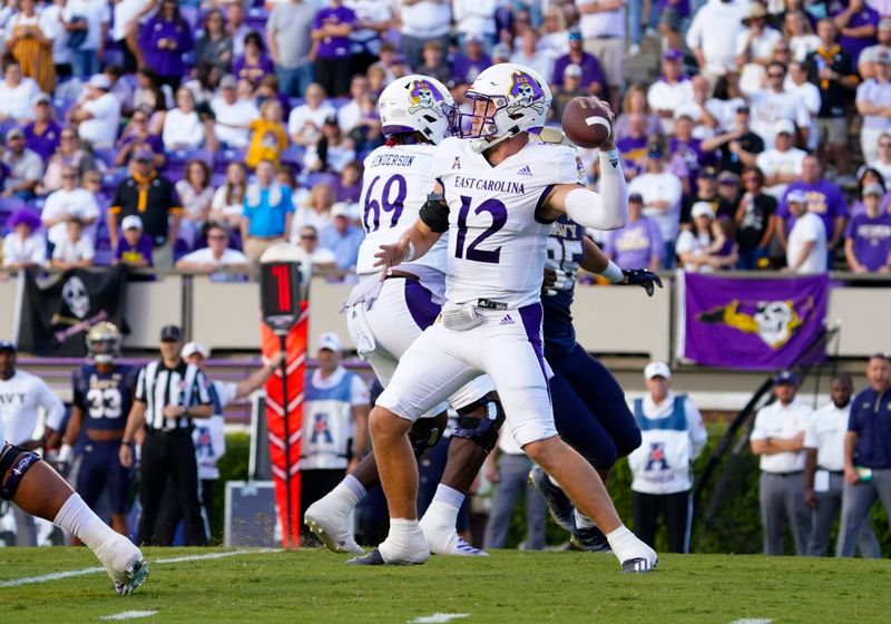 Sep 24, 2022; Greenville, North Carolina, USA;  East Carolina Pirates quarterback Holton Ahlers (12) throws the ball against the Navy Midshipmen during the first half at Dowdy-Ficklen Stadium. Mandatory Credit: James Guillory-USA TODAY Sports