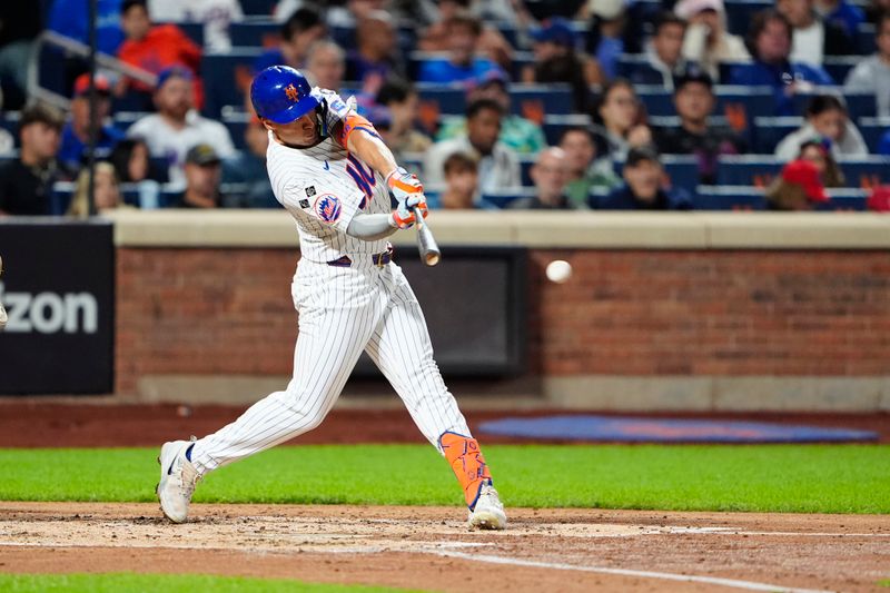 Sep 22, 2024; New York City, New York, USA;  New York Mets center fielder Tyrone Taylor (15) hits an RBI single against the Philadelphia Phillies during the second inning at Citi Field. Mandatory Credit: Gregory Fisher-Imagn Images