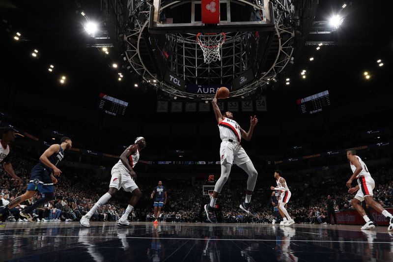 MINNEAPOLIS, MN -  MARCH 4: Jabari Walker #34 of the Portland Trail Blazers rebounds the ball during the game against the Minnesota Timberwolves on March 4, 2024 at Target Center in Minneapolis, Minnesota. NOTE TO USER: User expressly acknowledges and agrees that, by downloading and or using this Photograph, user is consenting to the terms and conditions of the Getty Images License Agreement. Mandatory Copyright Notice: Copyright 2024 NBAE (Photo by Jordan Johnson/NBAE via Getty Images)