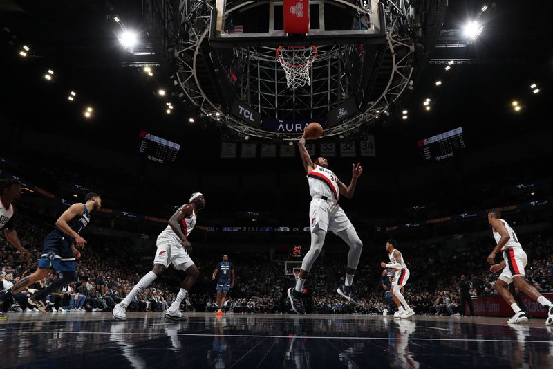 MINNEAPOLIS, MN -  MARCH 4: Jabari Walker #34 of the Portland Trail Blazers rebounds the ball during the game against the Minnesota Timberwolves on March 4, 2024 at Target Center in Minneapolis, Minnesota. NOTE TO USER: User expressly acknowledges and agrees that, by downloading and or using this Photograph, user is consenting to the terms and conditions of the Getty Images License Agreement. Mandatory Copyright Notice: Copyright 2024 NBAE (Photo by Jordan Johnson/NBAE via Getty Images)