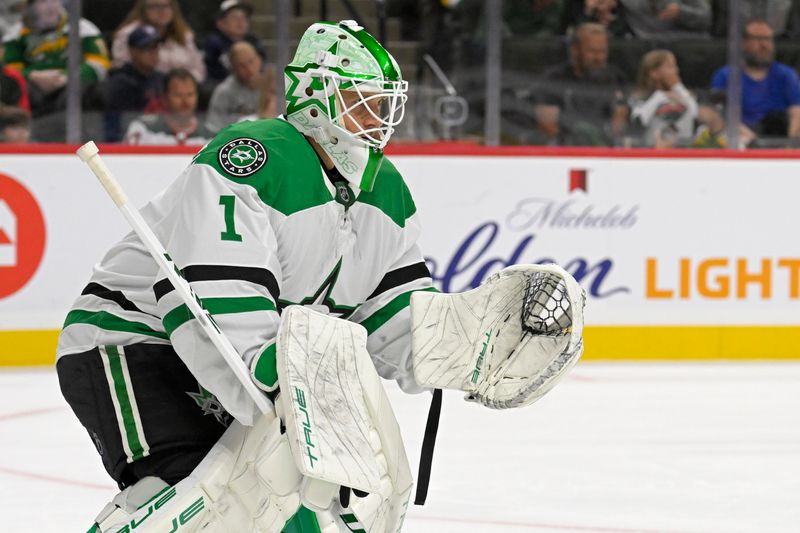 Sep 29, 2024; Saint Paul, Minnesota, USA;  Dallas Stars goalie Casey DeSmith (1) looks on in the second period against the Minnesota Wild at Xcel Energy Center. Mandatory Credit: Nick Wosika-Imagn Images