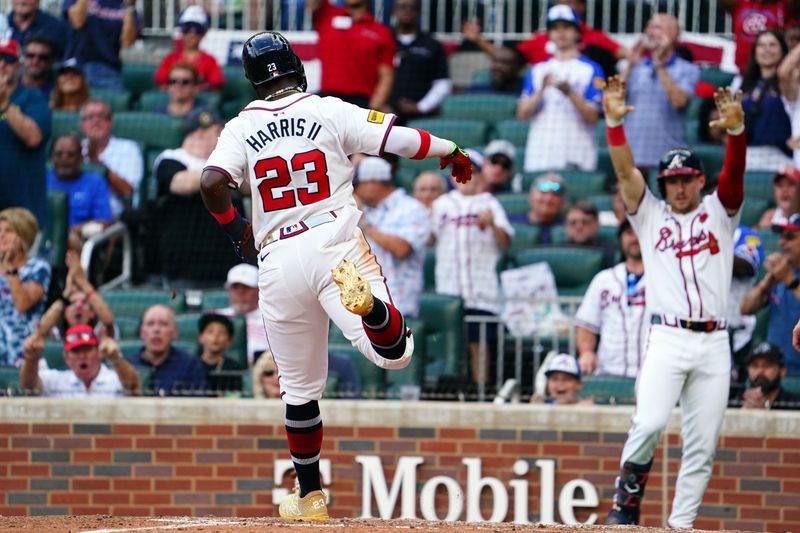 May 27, 2024; Cumberland, Georgia, USA; Atlanta Braves outfielder Michael Harris II (23) scores a run against the Washington Nationals during the seventh inning at Truist Park. Mandatory Credit: John David Mercer-USA TODAY Sports