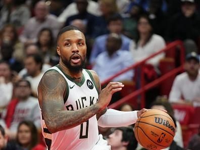 MIAMI, FLORIDA - NOVEMBER 28: Damian Lillard #0 of the Milwaukee Bucks dribbles the ball against the Miami Heat in the second half during the NBA In-season Tournament game at Kaseya Center on November 28, 2023 in Miami, Florida. NOTE TO USER: User Expressly acknowledges and agrees that, by downloading and or using this photograh, User is consenting to the terms and conditions of the Getty Images License Agreement. (Photo by Rich Storry/Getty Images)