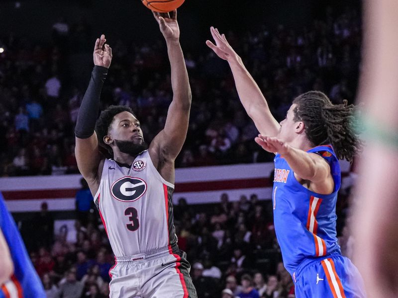 Feb 17, 2024; Athens, Georgia, USA; Georgia Bulldogs guard Noah Thomasson (3) shoots against the Florida Gators during the first half at Stegeman Coliseum. Mandatory Credit: Dale Zanine-USA TODAY Sports
