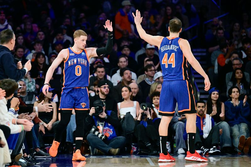 NEW YORK, NEW YORK - FEBRUARY 10:  Donte DiVincenzo #0 of the New York Knicks congratulated by Bojan Bogdanovic #44 after scoring a basket against the Indiana Pacers \d1h at Madison Square Garden on February 10, 2024 in New York City. NOTE TO USER: User expressly acknowledges and agrees that, by downloading and or using this photograph, User is consenting to the terms and conditions of the Getty Images License Agreement. (Photo by Steven Ryan/Getty Images)